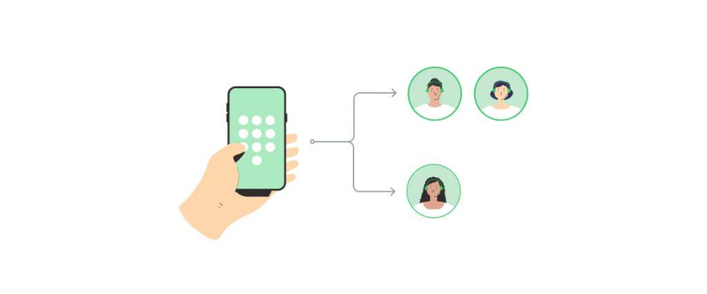 * A hand holding a smartphone with video call icons for three people on the screen. 
* A close-up of a hand holding a mobile phone engaged in a three-way video call. 
* A digital illustration of a smartphone in hand being used for a three-person video conference. 